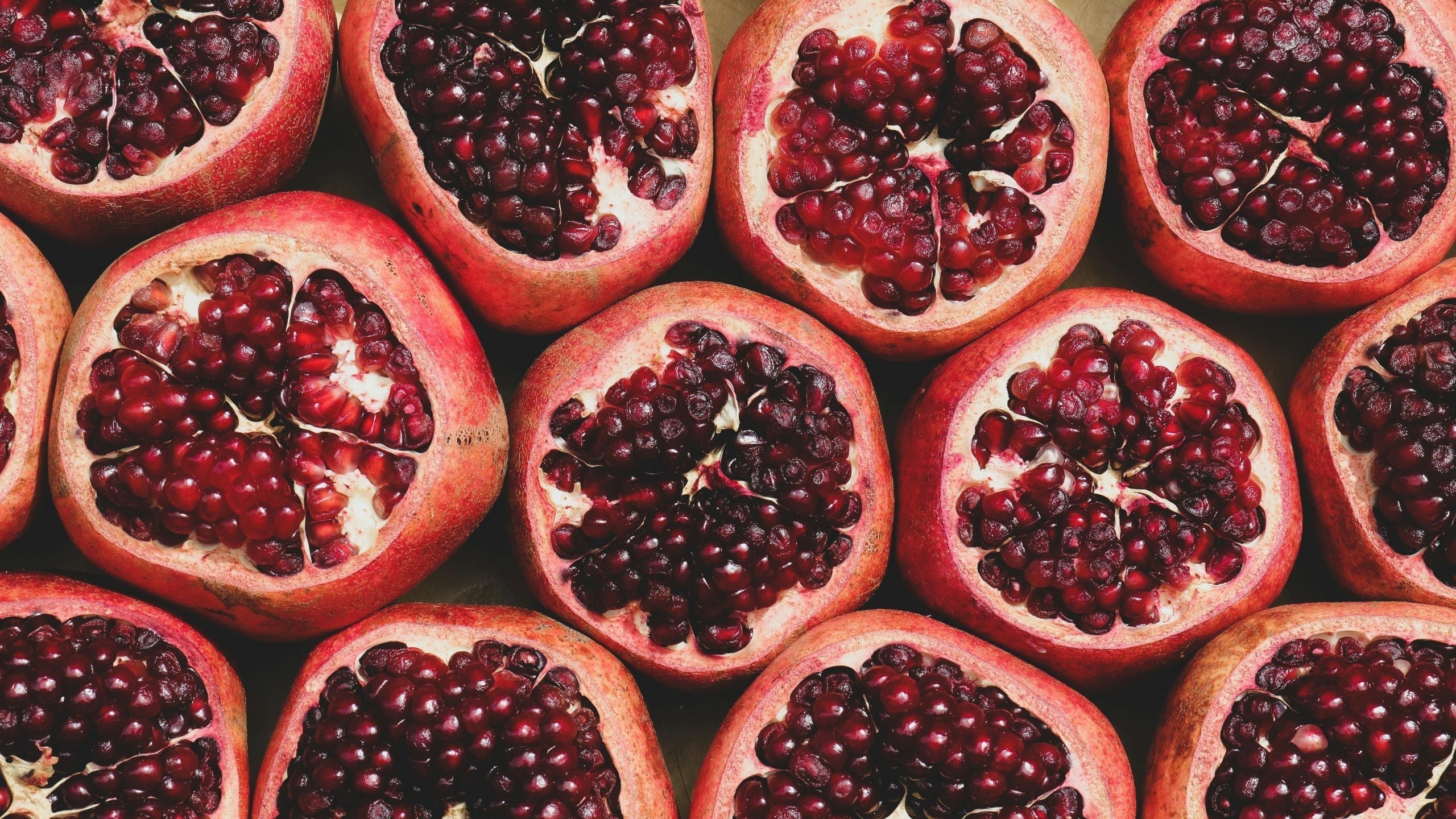 Pomegranate in perfumery: history, famous fragrances & handmade scented candles